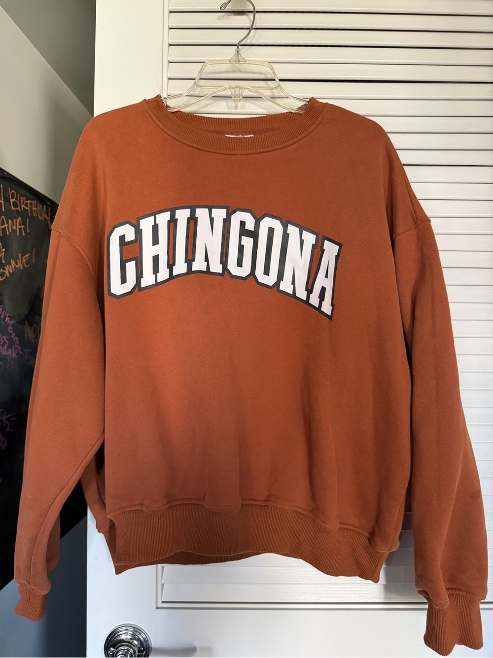 CHINGONA Crewneck Sweatshirt - Rust Orange with White & Black Lettering